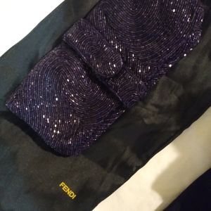 Purple beaded clutch